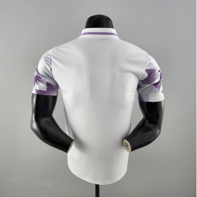 POLO 22/23 REAL MADRID MORADO Y BLANCO